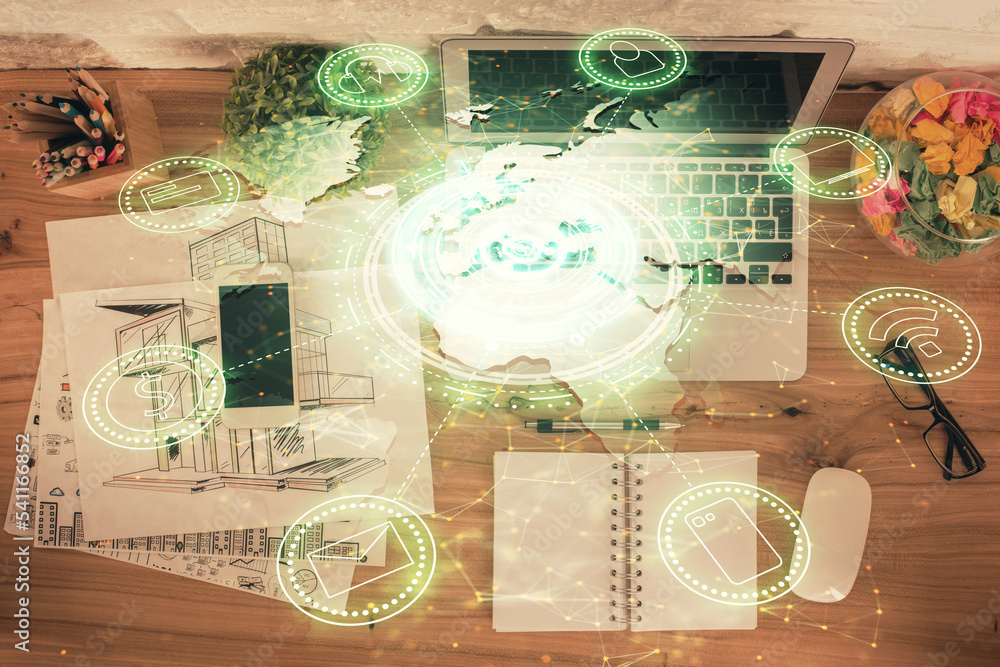 Poster social network hologram drawings over computer on the desktop background. top view. double exposure.