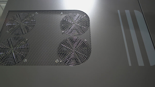 Black panel of four radiator coolers of battery load bank. Turned off collers.