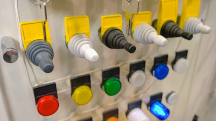 Multi-colored buttons. Production line control panel. Manufacturing and electricity concept.