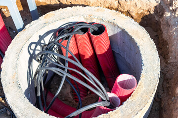 The ends of the electrical cable in the trench. electrical cable installation. Foundation for...