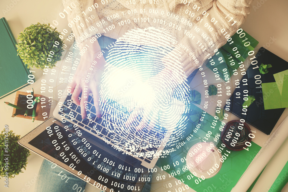 Poster double exposure of woman hands working on computer and fingerprint hologram drawing. top view. digit