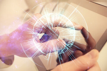 Double exposure of man's hands holding and using a phone and international business theme drawing.