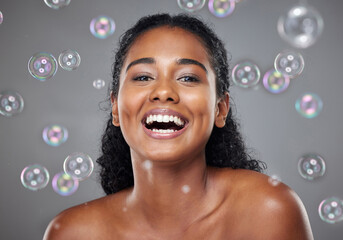 Beauty, makeup and skincare woman with bubble for facial cleaning, hygiene and self care wellness. Health lifestyle, cosmetics product or aesthetic face portrait of happy model girl with soap bubbles