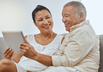 Love, senior couple and tablet being happy, smile and relax together on living room couch. Romantic, man and woman with digital device for bonding, anniversary and marriage or scroll online on sofa.