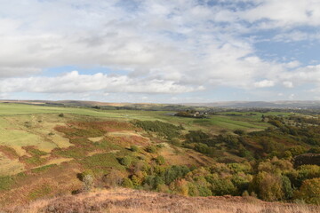 Countryside views from the top of a mountain  with rural farmland and far reaching views. Taken in Bury Lancashire England. 