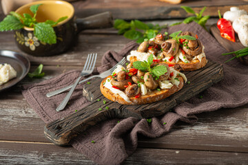 Spread on bread with ragout mushrooms