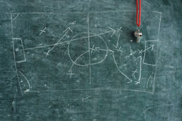 soccer tactics scribble on blackboard and whistle of soccer referee or trainer. Great soccer event...