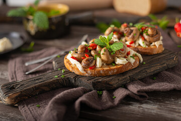 Spread on bread with ragout mushrooms