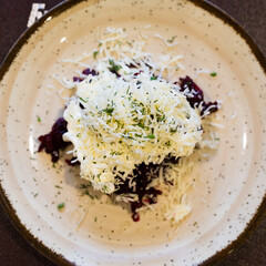 grated boiled beets with garlic, cheese and mayonnaise. top view