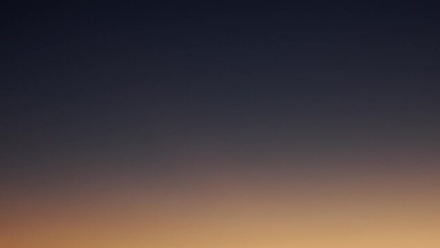Tokyo,Japan - October 26, 2022: (12x times speed) Changing color of sky at dawn
