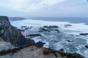 Fototapeta na wymiar clifftop view looking over a dusk ocean horizon