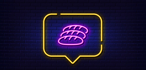 Neon light speech bubble. Bread line icon. Bakery food sign. Pastry baguette symbol. Neon light background. Bread glow line. Brick wall banner. Vector