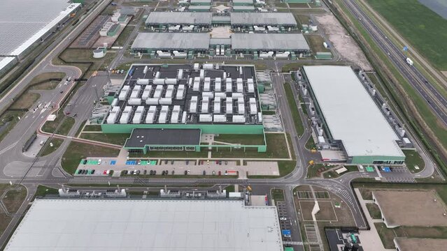 Datacenter building complex computing center in Hollands Kroon. Data technology ICT equipment building housing like servers. Building facility communication tech.