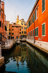 Typical canal in Venice with colorful houses