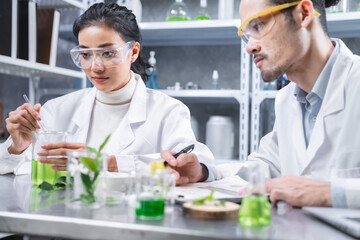 chemistry scientist working on biotechnology cosmetic research with natural herb medicine...