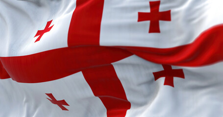 Fototapeta premium Close-up view of the Georgia national flag waving in the wind