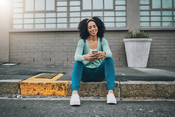 Black woman, city sidewalk and smartphone in hand scroll social media smile sitting on the street...