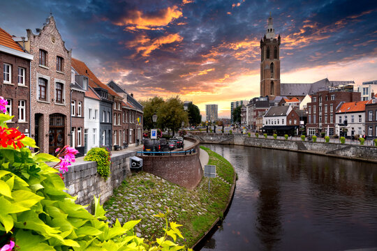 Cityscape of Roermond with river Maas at sunset