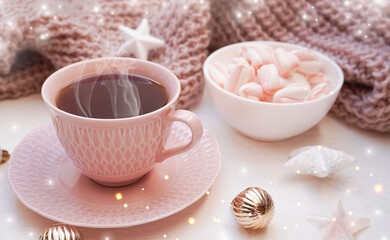  Winter, Christmas, New Year decorations composition, concept, background. Mug, cup of tea, coffee and meringue. Christmas lights. Christmas mood. Morning, breakfast. Christmas greeting card.