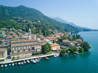 Fototapeta na wymiar Aerial video shooting with drone on Salò, famous Lombardia city on the Garda Lake