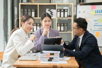 Asian businessmen talk about new projects have fun.