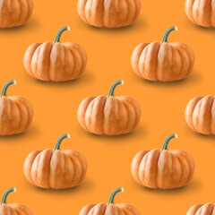 Seamless pattern of big pumpkins on orange background. Autumn harvest concept.