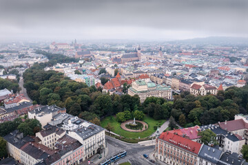 Cracow, Lesser Poland, Poland - September 22 2022: Aerial view of Krakow Old Town. Drone shot of Planty, Floryjan Straszewski monument, Juliusz Slowacki Theatre and historic center Mariacki Church and