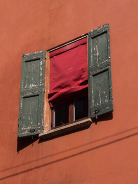 Bologna house window with wooden shutters - Bologna, Italy