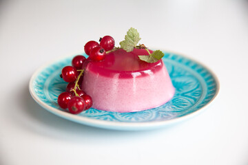 Red currant Panna Cotta with berry sauce