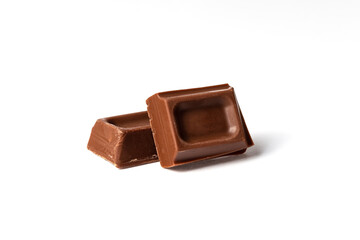 Pieces of chocolate on a white background. Isolate. Photo