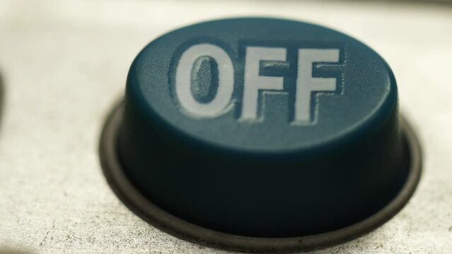 finger presses the off button. High quality 4k footage