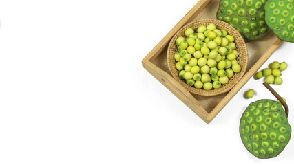 Fresh lotus and lotus seeds on white background