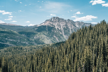 Fototapeta premium Rocky Mountains landscape with cloudy sky