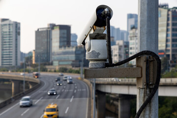 Security camera on the bridge watching after the car traffic, and speed control. Closeup of traffic...