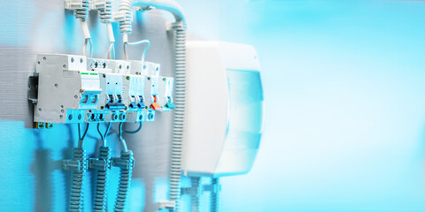 Electrical banner with copy space. Electrical board with automatic switches, cables and different...