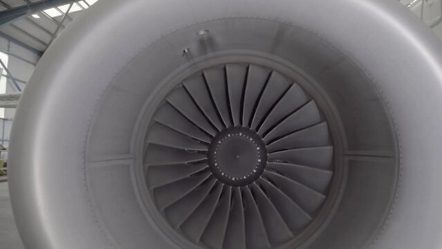 Aircraft engine in service. Passenger plane on regular service in the aircraft repair hangar
