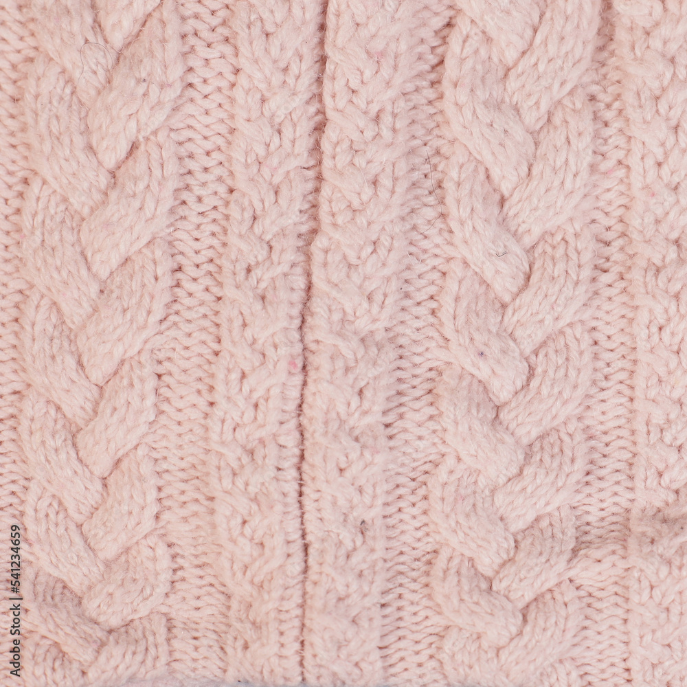 Poster texture hand-knitted or machine knitting pattern braid. fabric background close-up