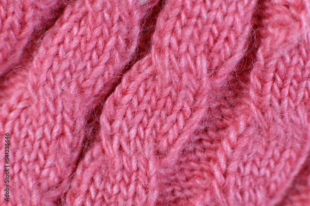 Aufkleber texture hand-knitted or machine knitting pattern braid. fabric background close-up
