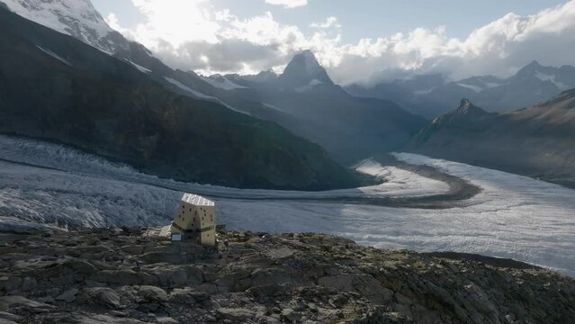 The Monte Rosa hut in Switzerland alps. Drone flight to the left