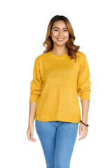 Obraz premium Attractive positive young asian brunette woman in yellow sweater on white background.