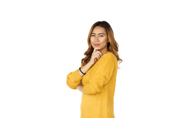 Attractive positive young asian brunette woman in yellow sweater on white background.