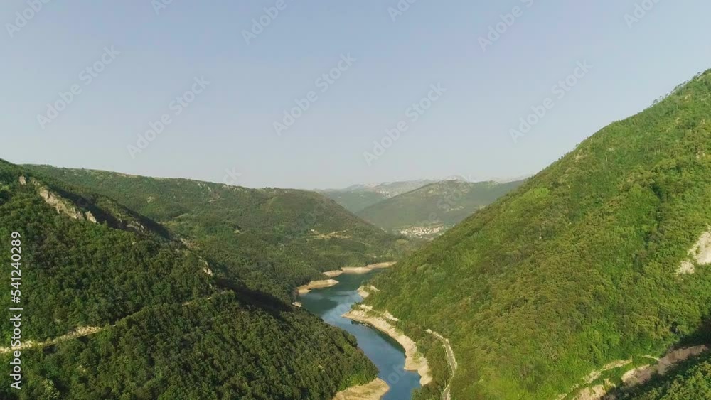 Wall mural Aerial video. View of the beautiful blue mountain lake