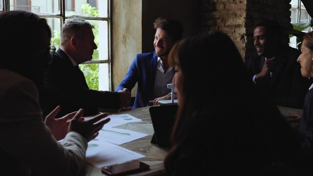 Business people working on sustainable renewable energy project inside office - Green alternative electricity concept