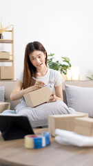 Online selling business, Small business owners are checking inventory in order to prepare them for proper delivery to customers, Online shopping SME entrepreneur, Delivery of goods to consumers.