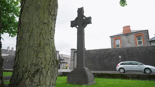 Slow motion of an old Irish Celtic cross in Athlone, Ireland