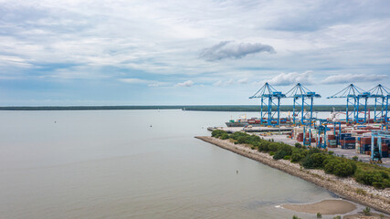 Klang, Malaysia - October 09, 2022: Cranes at the port Klang near Kuala Lumpur. Container crane at...