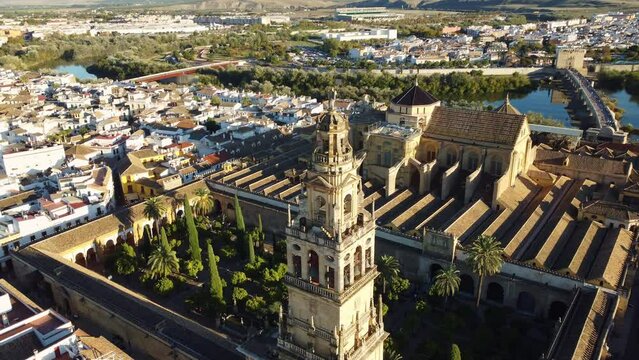 Cordoba, Spain: Aerial drone footage of the famous Cordoba  Mezquita-Catedral dating to the Moorish period in  Andalusia in southern Spain. Shot with a tilt down and rotation motion. 