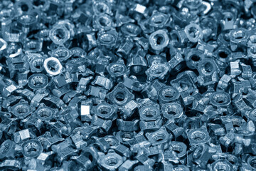 The pile of galvanize special hexagon nuts with anti loos washer.