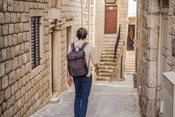 The man in Ulcinj town in Montenegro. Clock Tower of Ulcinj Sahat Kulla. Lami Mosque. Ulcinj is a popular tourist destination in the summer on the southern Adriatic coast of Montenegro. Ulqin