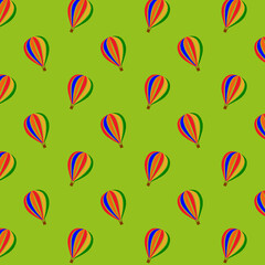 Balloon seamless pattern on light green background. Aerostat pattern. Colorful aerostat. Multicolored aerostat 